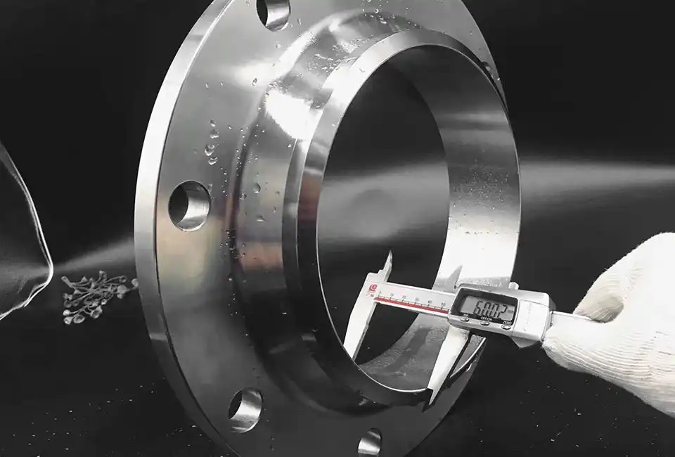 What coatings and post-treatments improve corrosion resistance for CS flanges